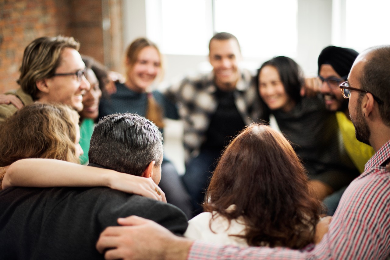 People with joined hands as a team People with joined hands as a team